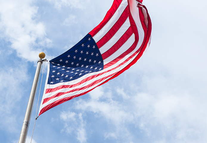 U.S. flag waving in the sky